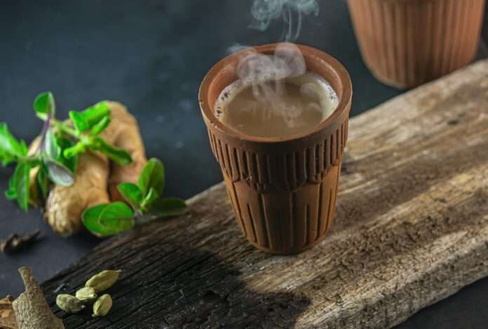 Hot Tandoori Tea (Indian milk tea) with its ingredients