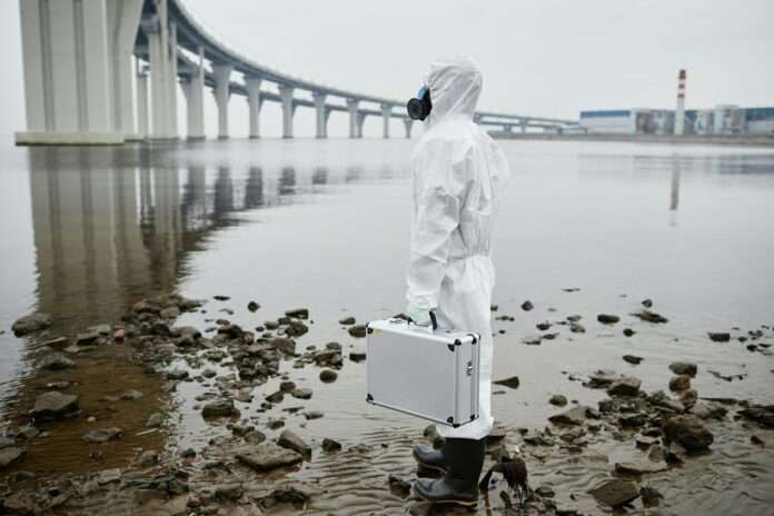 Eco Disaster Worker at Industrial Site